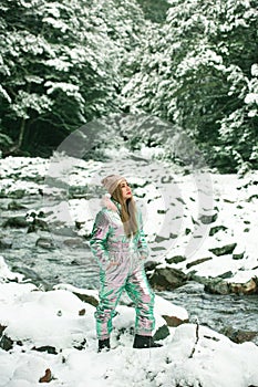 Beautiful asian woman enjoy view with snow during winter in New Zealand.