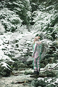 Beautiful asian woman enjoy view with snow during winter in New Zealand.