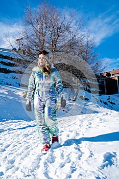 Beautiful asian woman enjoying and relaxing view with snow flake on snow mountain during winter in New Zealand