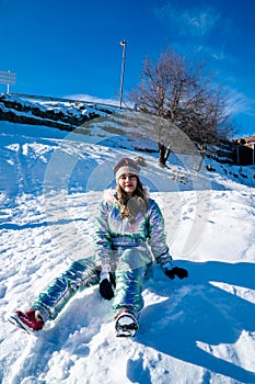 Beautiful asian woman enjoying and relaxing view with snow flake on snow mountain during winter in New Zealand