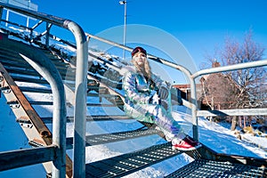 Beautiful asian woman enjoying and relaxing view with snow flake on snow mountain during winter in New Zealand