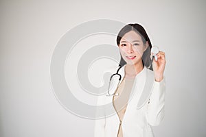 Beautiful asian woman female doctor isolated on white background