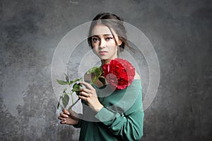 Beautiful asian woman hold  peony flower. Cosmetics, make-up. Perfumery concept