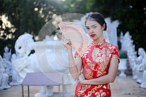 Beautiful asian woman holding dollars or money with lucky pocket money,in the Chinese New Year. Festivities, New Year Celebration