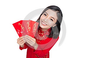 Beautiful Asian woman holding red pocket - lucky money. Tet holiday. Lunar New Year. Text mean Happiness and Lucky