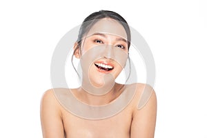 Beautiful Asian woman looking at camera smile with clean and fresh skin