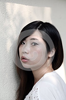 Beautiful Asian woman looking at the viewer