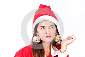 Beautiful asian woman in Santa Claus hat thinking