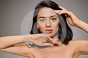 beautiful asian woman with shimmery green