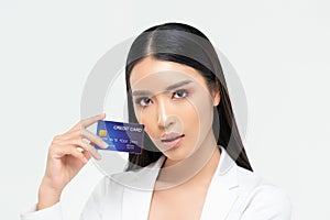 Beautiful Asian woman showing credit card