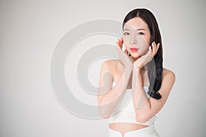 Beautiful asian woman with skin care or facial care concept isolated on white background, beauty treatment surgery concept.