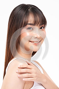 Beautiful Asian woman smile with clean and fresh skin