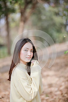 Beautiful Asian woman Smiling happy girl and wearing warm clothe