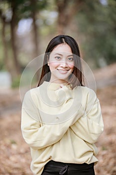 Beautiful Asian woman Smiling happy girl and wearing warm clothe