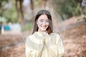 Beautiful Asian woman Smiling happy girl and wearing warm clothe