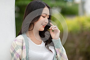 Beautiful asian young woman smile and cheerful. Confident cute female looking at camera relax and happiness with wellness life.