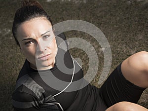 Beautiful athlete woman resting after training photo