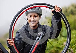 Beautiful, athletic, mixed race young woman exercising outside in the forest. Healthy and sporty female athlete out for