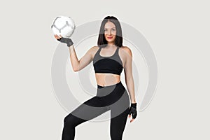 Beautiful athletic woman with the ball