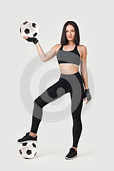 Beautiful athletic woman with the ball