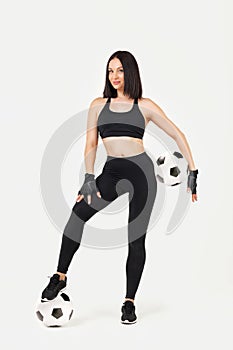 Beautiful athletic woman with the ball