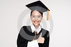 Beautiful Attractive Asian woman graduated in cap and gown smile so proud