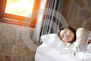 Beautiful Attractive Asian woman sleep and sweet dream on bed