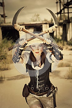 Beautiful attrctive agressive female warrior holding two swords