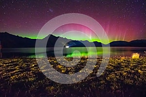 Beautiful Aurora Australis and milky way over Lake Wakatipu, Kinloch, New Zealand South Island