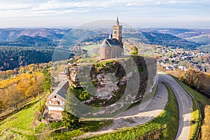 Beautiful autumn aerial view of St. Leon chapel dedicated to Pope Leo IX atop of Rocher de Dabo or Rock of Dabo, France photo