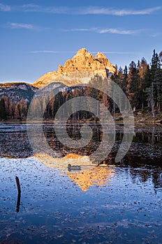 Beautiful autumn evening Lake Antorno and Three Peaks of Lavaredo, Dolomites, Italy