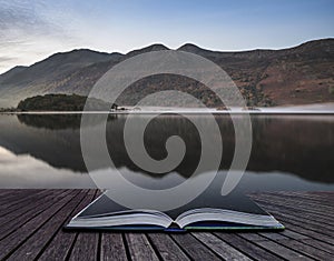 Beautiful Autumn Fall landscape image of Crummock Water at sunrise in Lake District England coming out of pages of book