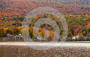 Beautiful autumn foliage and cabins in Elmore state park, Vermont