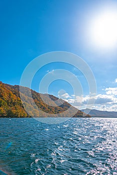 Beautiful autumn foliage scenery landscapes. View from shore of Lake Towada