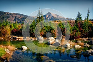 Beautiful autumn landscape with mountain peak and a lake, Krivan, Slovakia