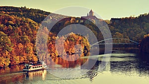 Beautiful autumn landscape with Veveri Castle. Natural colorful scenery with sunset. Brno dam-Czech Republic-Europe.