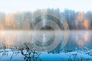 Beautiful autumn morning landscape of Kymijoki river waters in fog. Finland, Kymenlaakso, Kouvola photo