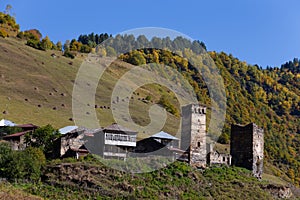 Beautiful autumn mountain landscape with svans tower in Svaneti. Georgia