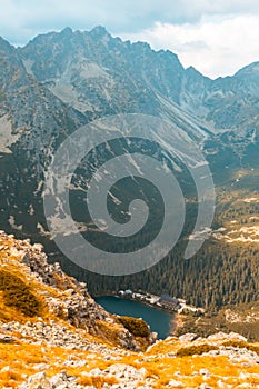 Beautiful autumn mountain landscape, yellow grass and mountain lake