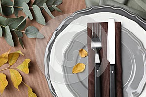 Beautiful autumn place setting and decor for festive dinner on table, flat lay