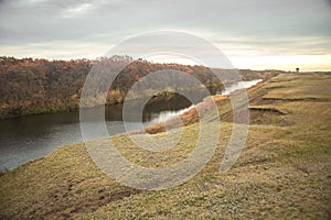 Beautiful autumn river landscape. The coast of the lake.