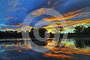 Beautiful autumn sunset at a lake. Prague, Czech Republic.