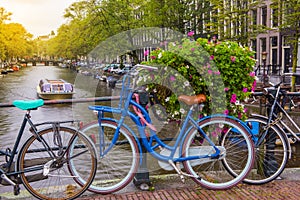 Beautiful autumn view of Amsterdam Canals with Bridge and typical Dutch Houses. Amsterdam