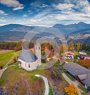 Beautiful autumn view from flying drone of Viumser church,