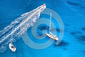 Azure bay with yachts in Greek sea photo
