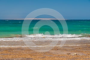 Beautiful azure red sea with waves and rocks in Egypt