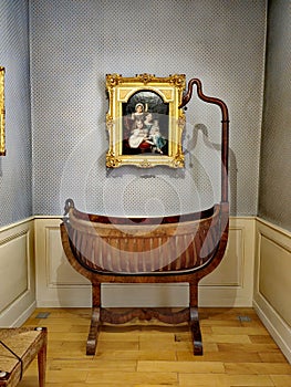 Beautiful baby crib in Tavel house, the oldest residential house in Geneva.