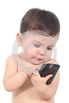 Beautiful baby playing and touching a mobile phone