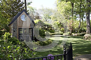 Beautiful back yard design with green house