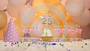 Beautiful background happy birthday number 25 with burning candles, birthday candles pink letters for twenty five years. Festive